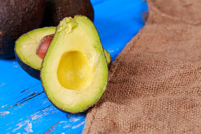 Close-up of avocado on table