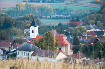 Houses in town against sky