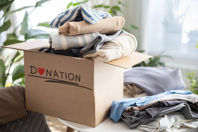 Midsection of woman holding gift box