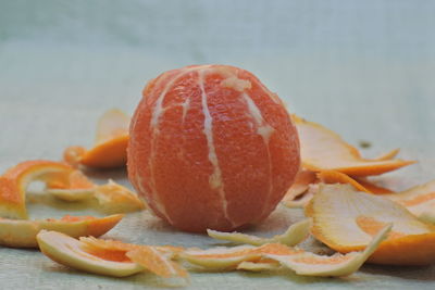 Close-up of orange slices in plate on table