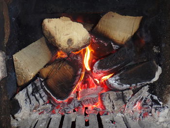 High angle view of burning firewood