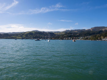 Scenic view of sea against blue sky
