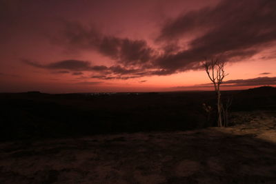 Scenic view of silhouette landscape against sky during sunset