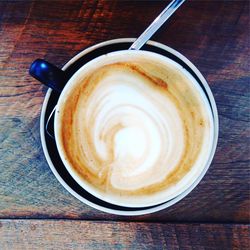 High angle view of cappuccino on table