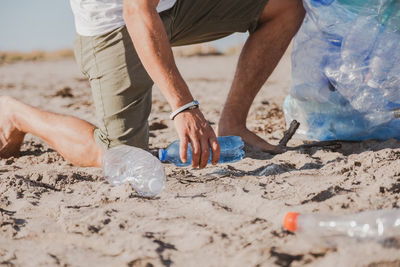 Low section of people working on beach