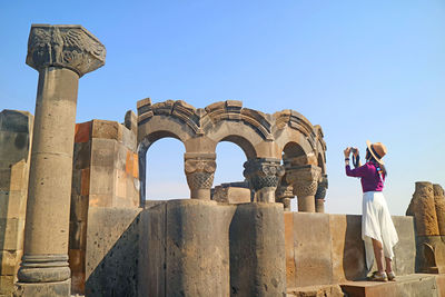 Low angle view of old ruins against clear sky