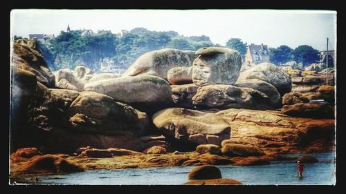 View of rocks in sea