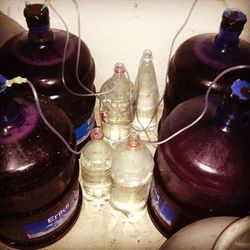 High angle view of bottles on table at home