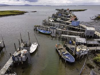 High angle view of boats moored at harbor