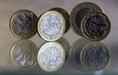 High angle view of coins on table