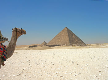 View of desert against clear sky