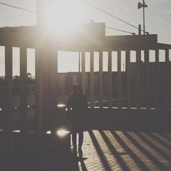 Silhouette of woman in city