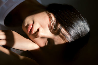 Close-up portrait of young woman