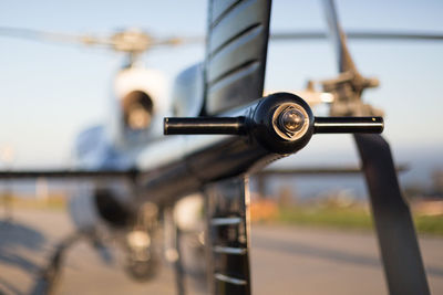 Close-up of coin-operated binoculars against sky