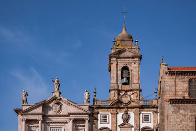 Low angle view of church building against sky in porto 