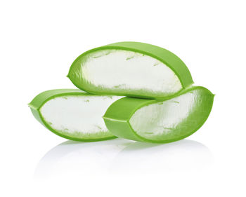 Close-up of aloe vera plants over white background