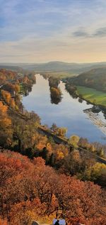 High angle view of lake against sky during autumn