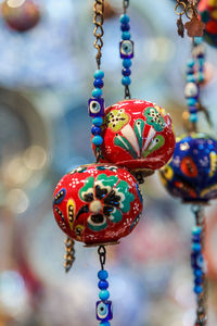 Close-up of decoration hanging at market stall