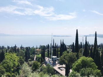 High angle view of trees and buildings against sky