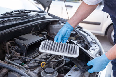 Man working in car