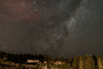 Scenic view of star field against sky at night