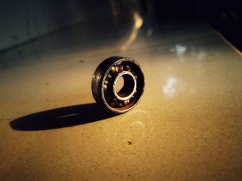 Close-up of metal object on table