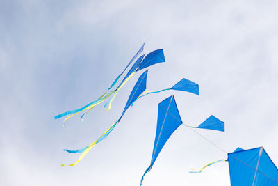 Low angle view of flag against sky