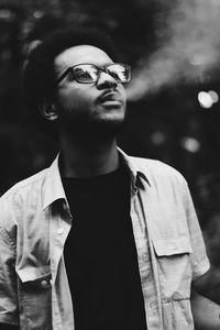 Portrait of young man looking away