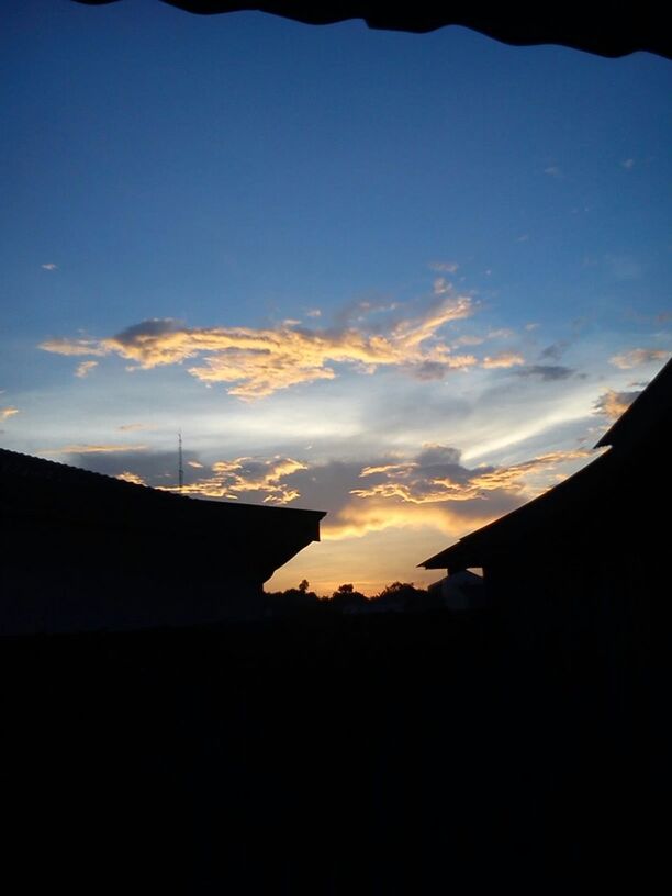 silhouette, sky, architecture, built structure, sunset, building exterior, low angle view, cloud - sky, cloud, dark, house, copy space, dusk, no people, building, blue, outdoors, roof, residential structure, sunlight