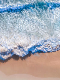 High angle view of waves at beach