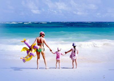 People enjoying at beach