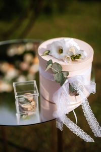 Close-up of wedding rings on table