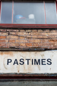 Close-up of text on wall