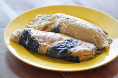 Close-up of fish served in plate on table