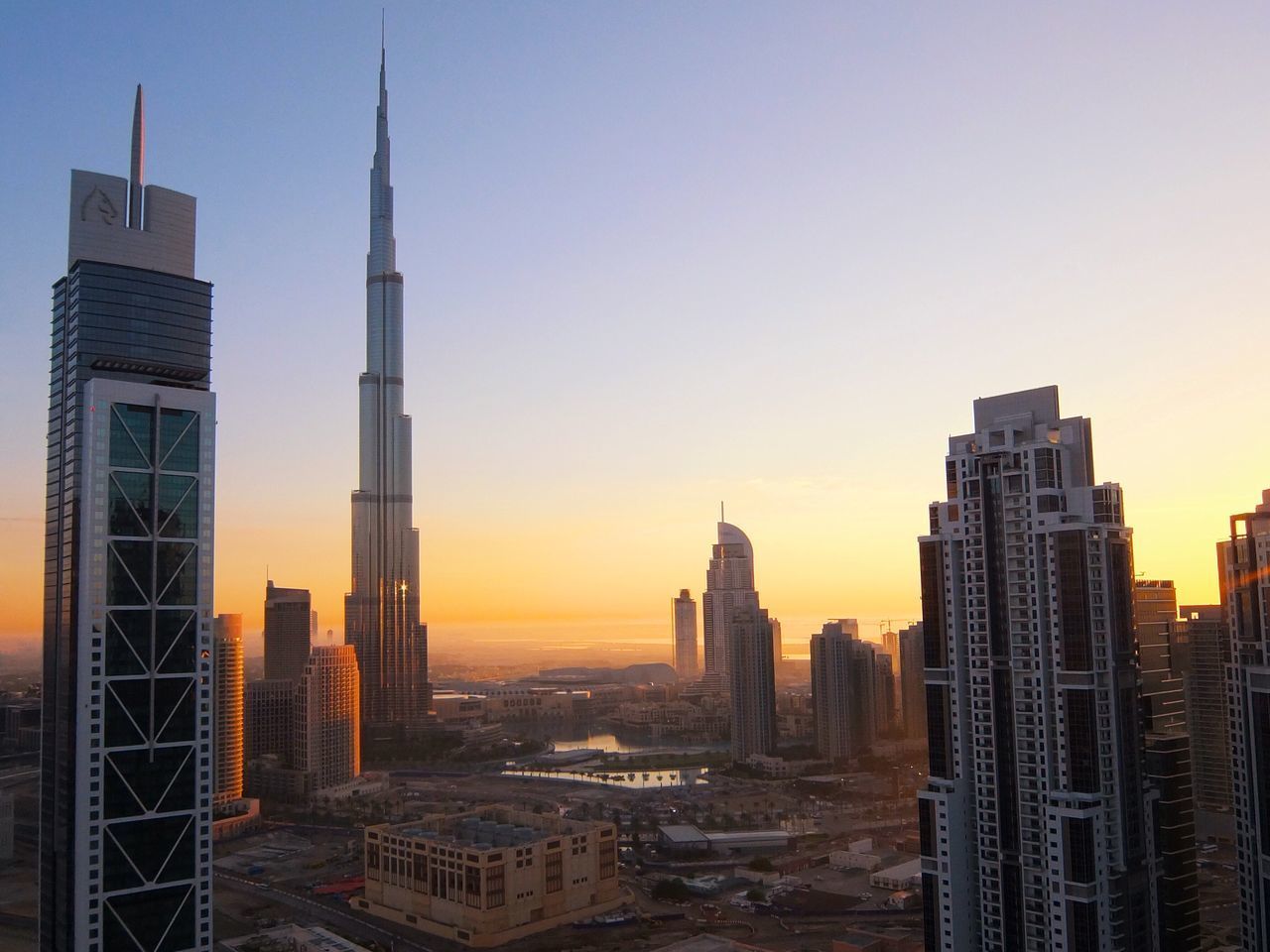 Buildings in city at dusk