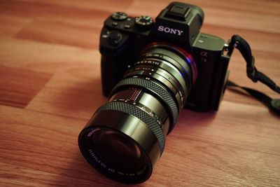 Close-up of camera on table