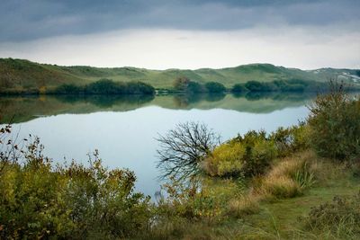 Scenic view of lake against sky