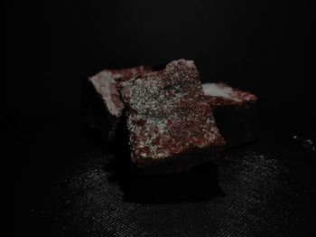 Close-up of ice cream over black background