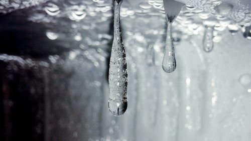 Close-up of water drops on glass
