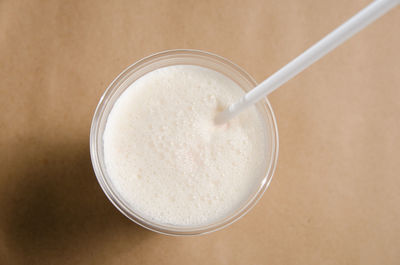 High angle view of drink in glass on table