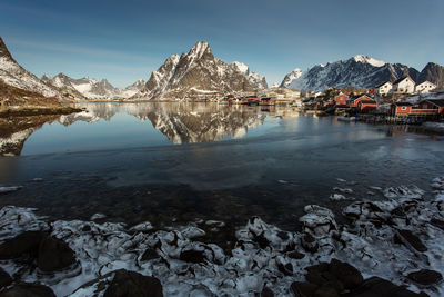 Scenic view of frozen lake against sky during winter