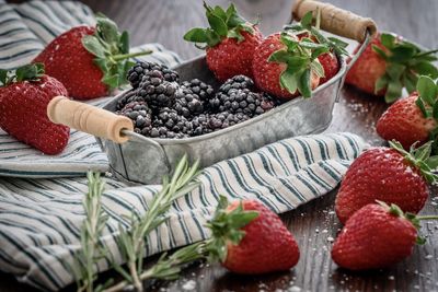 Close-up of strawberries in container on table
