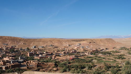 Scenic view of residential district against sky