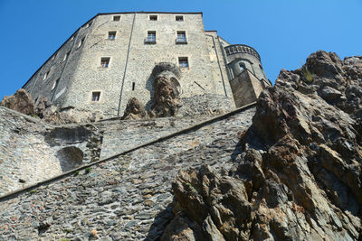 Low angle view of old building against sky