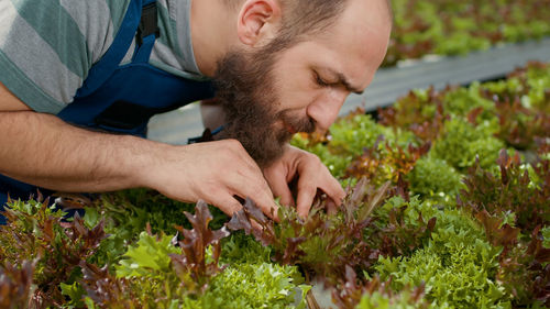 Close-up of young man gardening