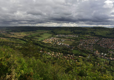 High angle view of agricultural landscape against sky