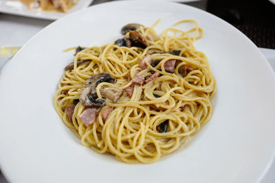 Close-up of noodles in plate on table