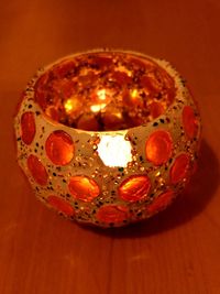 Close-up of illuminated lights on table