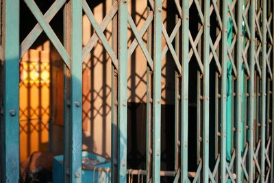 Full frame shot of metal fence against building