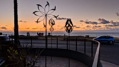 Scenic view of sea against sky at sunset